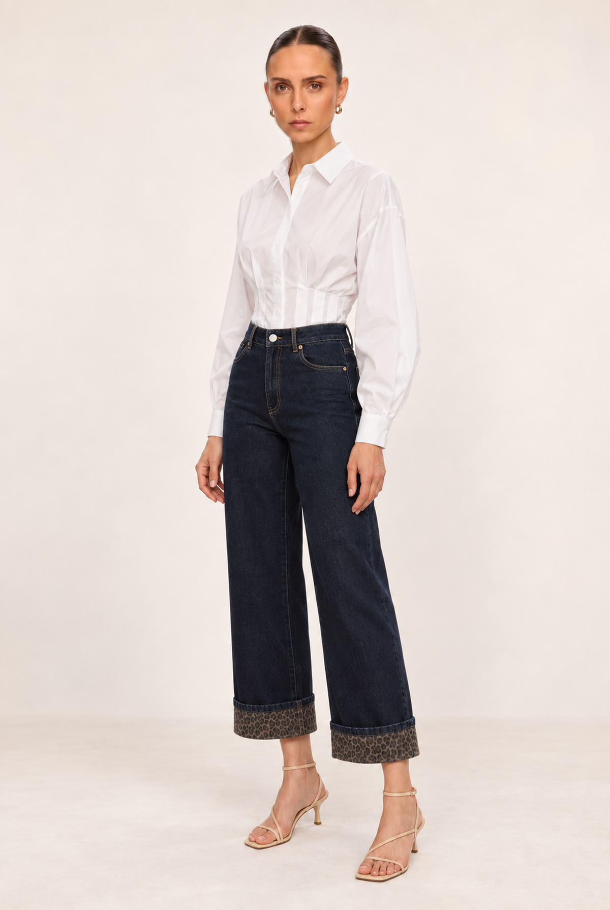 DARK INDIGO LEOPARD-CUFF WIDE-LEG JEANS - three-quarter view
