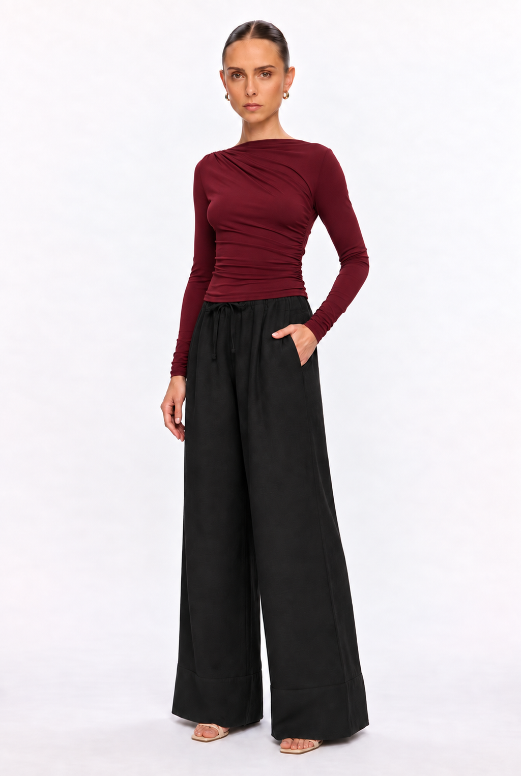 BURGUNDY ASYMMETRIC DRAPED KNIT TOP - three-quarter view