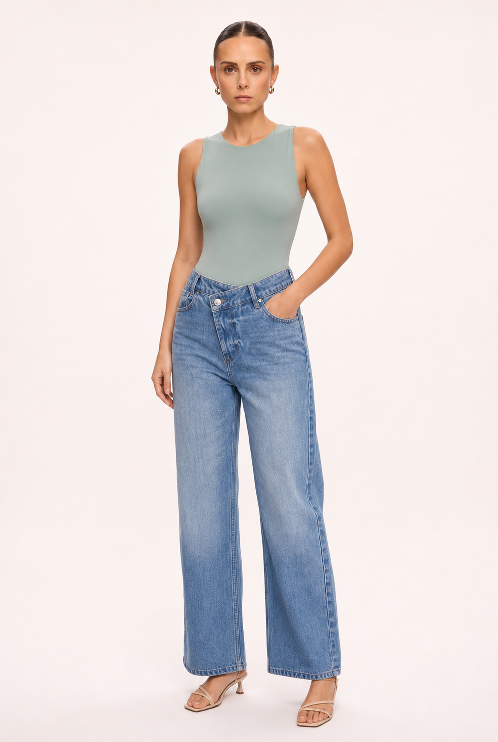 SAGE GREEN SLEEVELESS CREW NECK BODYSUIT - Three-quarter view