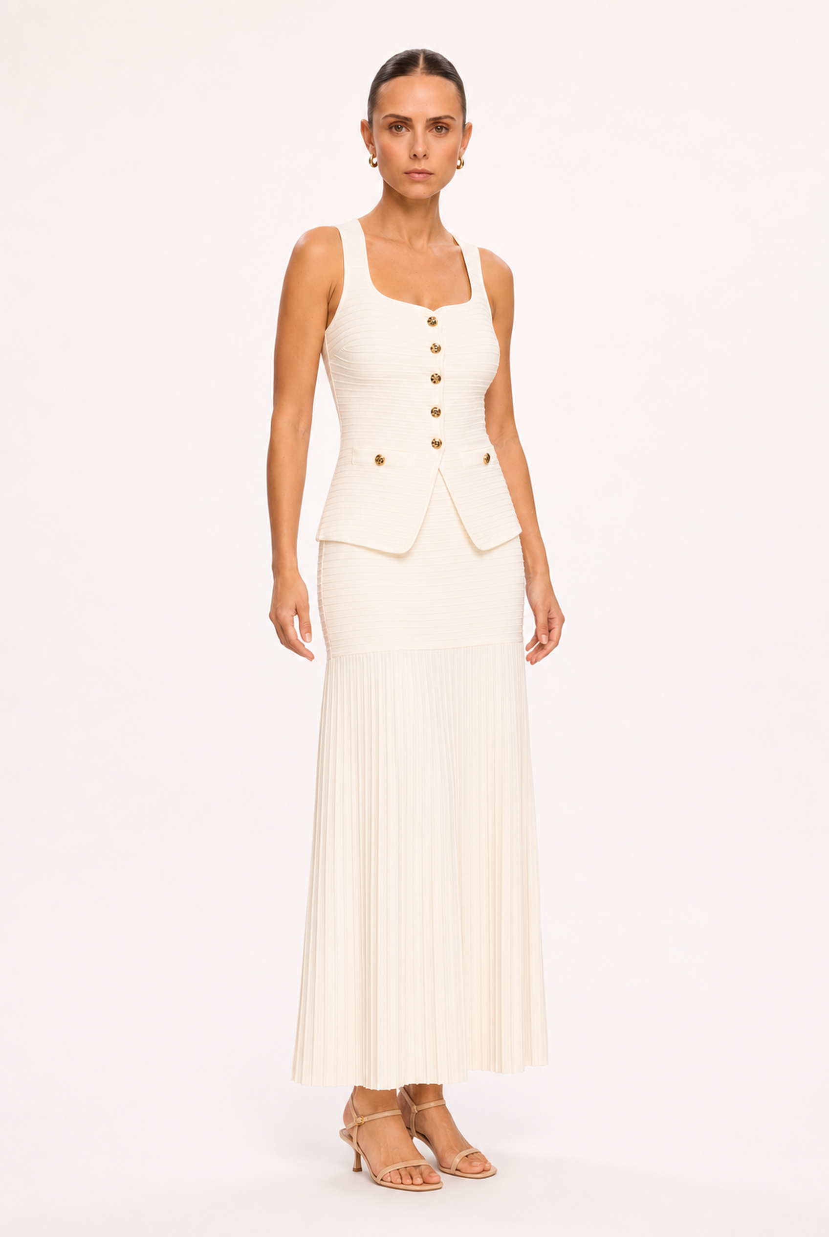 IVORY VEST AND PLEATED SKIRT SET - Three-quarter view